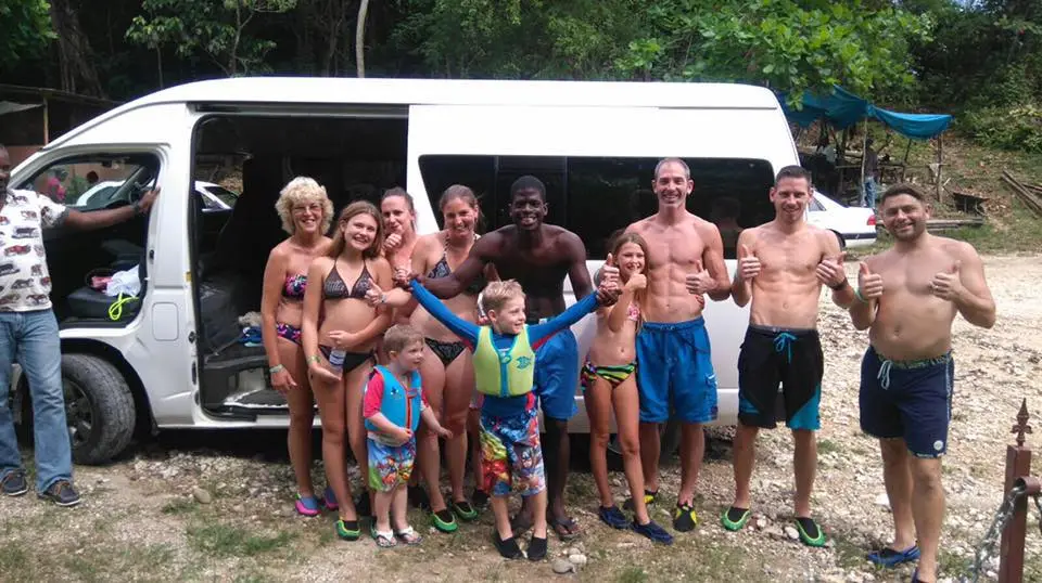A group of guests posing together on an Inside Tours Jamaica excursion