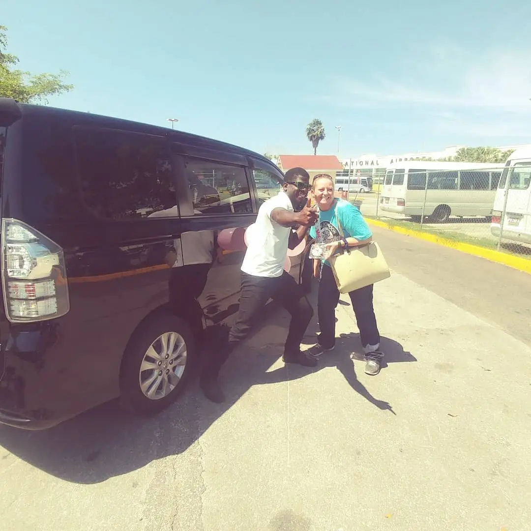 Inside Tours Jamaica team on the road with a private transfer vehicle